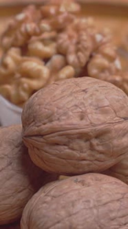 Vertical Video of Walnuts with Walnuts Kernels