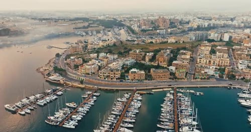 Captivating Aerial View of Marina in Valletta Malta with Moored Boats and Yachts