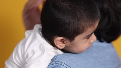 Child Enjoys A Warm Embrace From A Caregiver