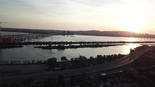 Scenic Aerials - Montreal skyline aerial pan to bridge construction