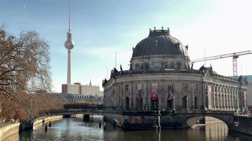 Historic Bode Museum and Fernsehturm Under Clear Winter Sky in Berlin