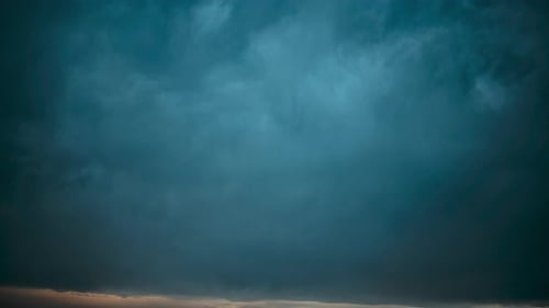 Dark Storm Clouds Billowing Across the Sky