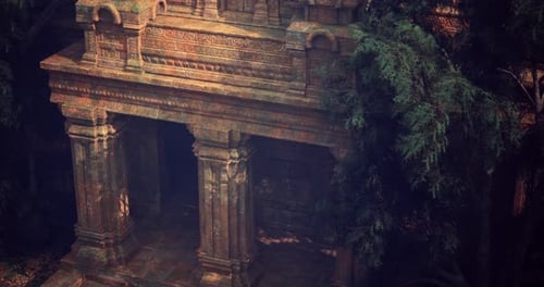 Exploring a Historical Stone Structure Surrounded By Trees at Sunset