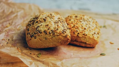 Two Freshly Baked Square Loaves of Bread with Seeds