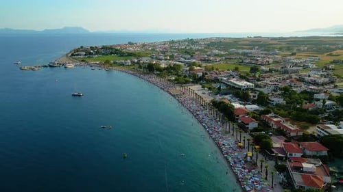 Beautiful view of the beach with boats, pure nature, sea and ships. Shot from a drone
