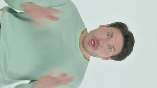 Adult Man Speaking and Gesturing on White Background