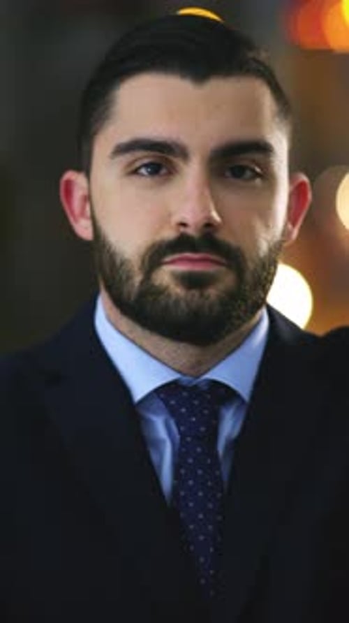 Serious, night and face of businessman in office with confidence for professional finance career