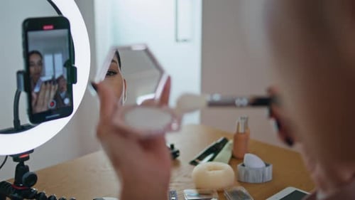 Woman Visagiste Applying Cosmetics at Mirror Close Up Blogger Recording Visage