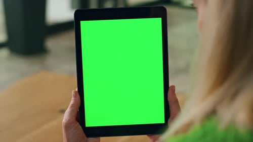 Woman Reading Tablet Presentation at Office