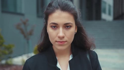Young Woman Portrait in City Setting