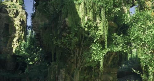 Lush Greenery Surrounds Towering Rock Formations in a Serene Natural Setting