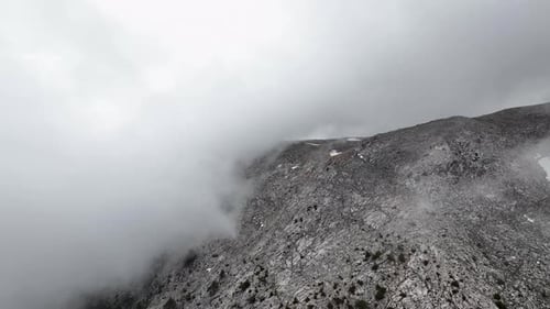 Aerial Splendor Captivating Cloudy Mountain Landscape