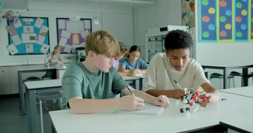 Students Studying Science in a Bright Classroom