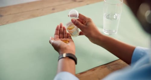 Woman With Pills and Water Inside
