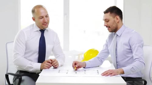 Business, Architecture and Office Concept - Two Smiling Businessmen or Architects With