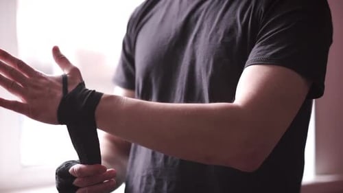 Person Wrapping Hands for Boxing, Exercise