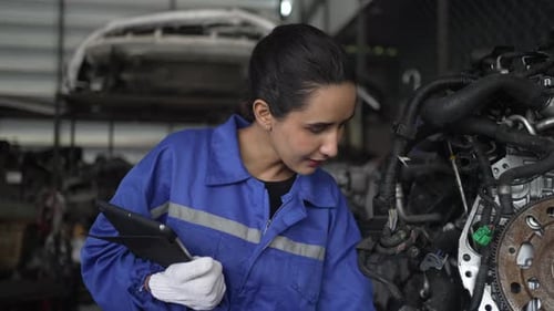Mechanic work at auto repair shop.