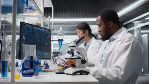 Scientists Working in a Modern Research Laboratory
