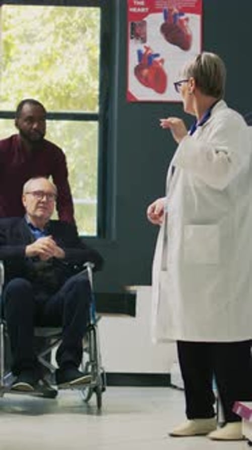 Vertical Video Male Caretaker Helping Senior Man in Wheelchair to Come at Pharmacy Shop