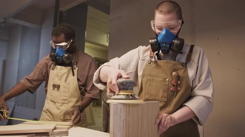 Craftspeople Working on Woodworking Project
