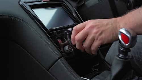 Car air conditioning being turned up right hand drive
