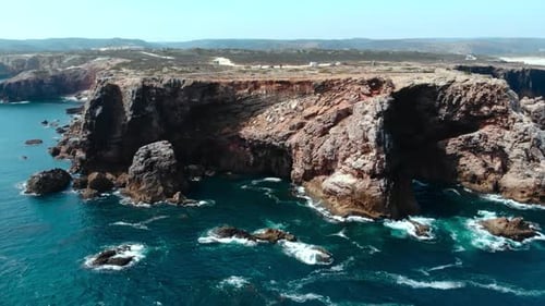 Dramatic Underwater and Coastal Scenes Filmed Cinematic Drone Shot Highlighting Powerful Sea and