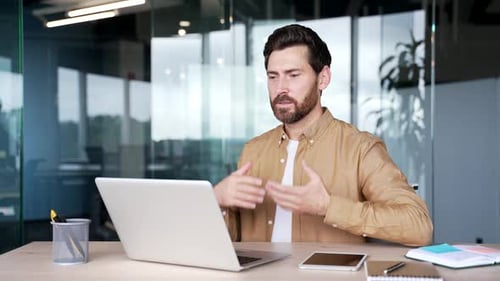 Professional Man on Video Conference in Modern Office