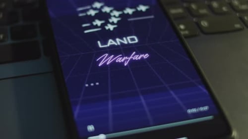 Futuristic Game on Cell Phone Display