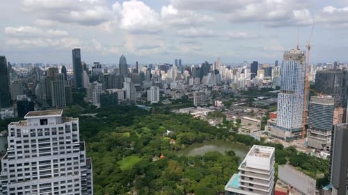 Aerial View of Bangkok Skyline with Lumphini Park and Modern Skyscrapers