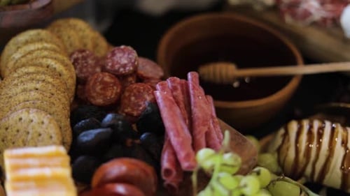 Close-Up of Delicious Charcuterie Board with Snacks