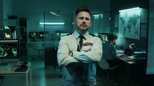 Portrait of Frowning Caucasian Army Lieutenant at Command Center