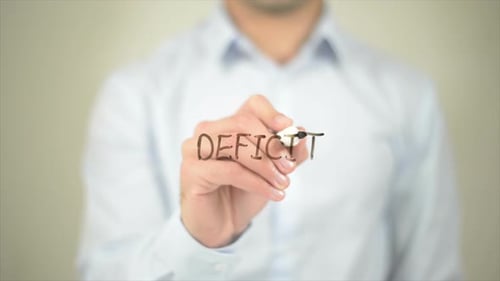 Deficit, Man Writing on Transparent Screen