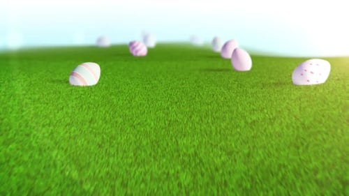 Animated Easter Eggs Moving Across a Green Grass Field