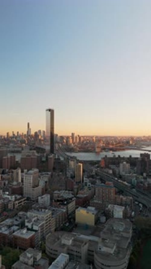 Vertical Sunset Views of One Manhattan Square Luxury Residential Skyscraper in Two Bridges