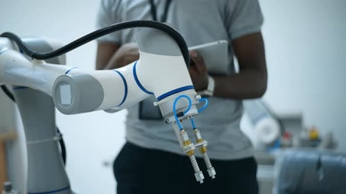 Modern Robotic Arm Operated by a Young Adult