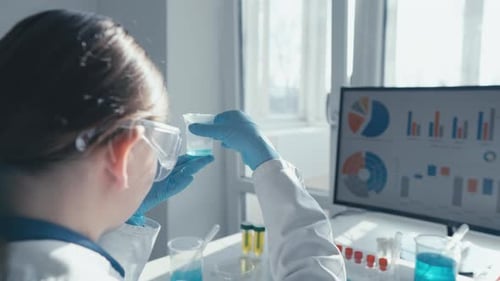 A Dedicated Laboratory Researcher is Meticulously Analyzing Complex Data Sets Within a Cuttingedge