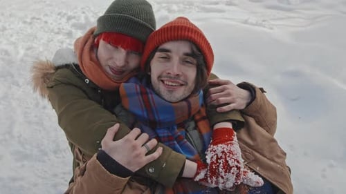 Affectionate Young Couple Embracing in a Winter Scene