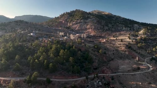 Beautiful Landscape of a Small Village on the Banks of a Mountain River Aerial View