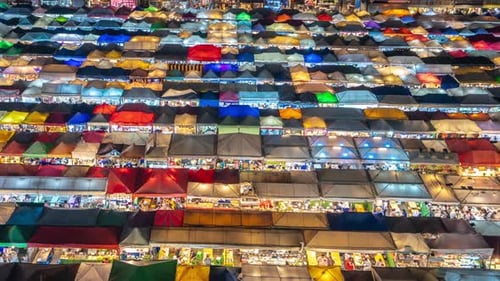 Timelapse of Colorful Train Ratchada Night Market in Bangkok, Thailand. Traditional Oriental Street