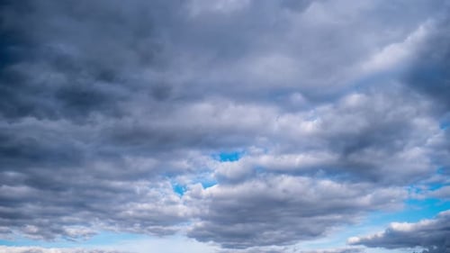 Dark Clouds Timelapse on Blue Sky