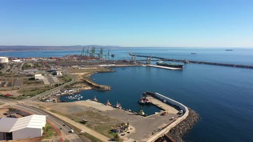 Aerial View Filmed By a Drone of a Containerized Cargo Terminal of Commercial Port Business