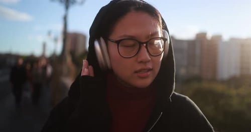 Young Adult Talking Outside in Urban Environment