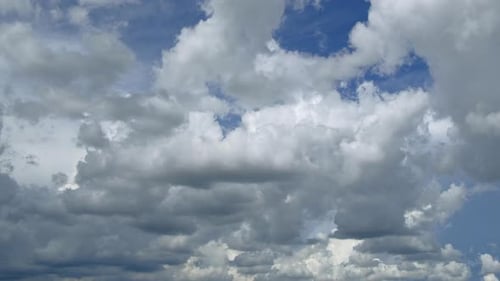 Clouds Moving Across a Blue Sky