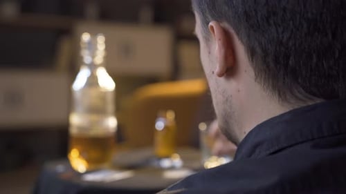 Alcohol addicted young man.