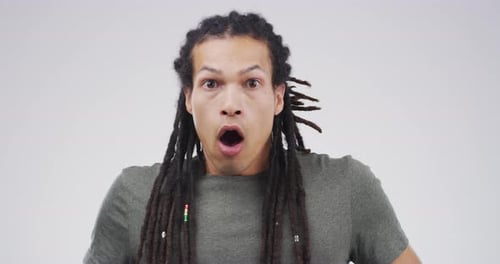 Surprised Man Reacts in Shock and Amazement
