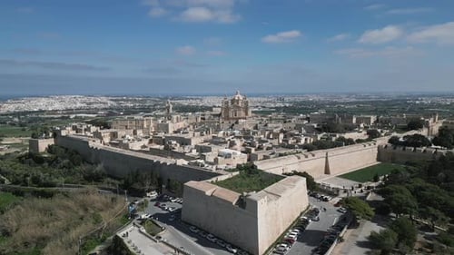Aerial video of the walled city of St Paul's Cathedral, Malta