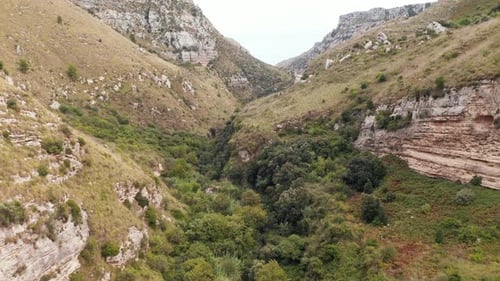 Flying Over Green Forest Between The Cavagrande del Cassibile Canyon Nature Reserve In Syracuse, Sic