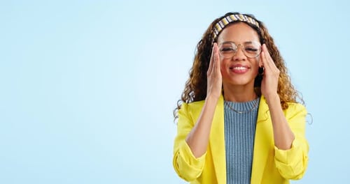 Glasses, happy and woman pointing to space in studio isolated on a blue background mockup