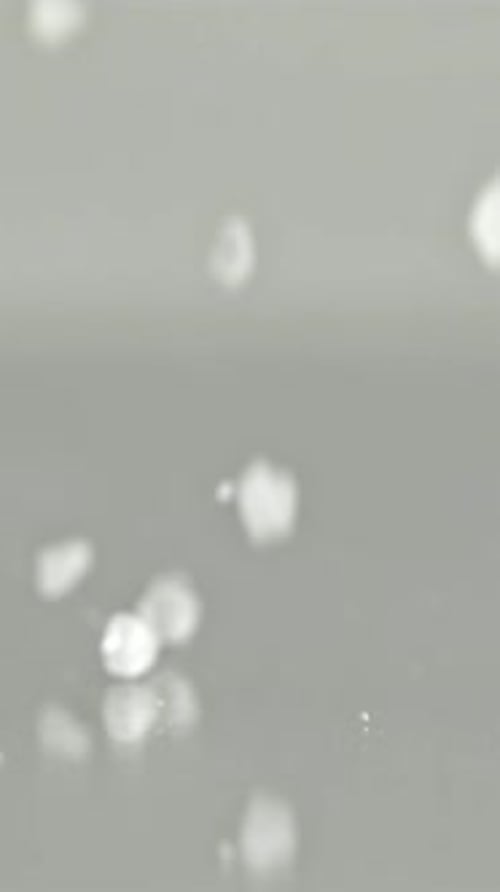 Super Slow Motion Falling Sea Salt Filmed on a Highspeed Camera at 1000 Fps