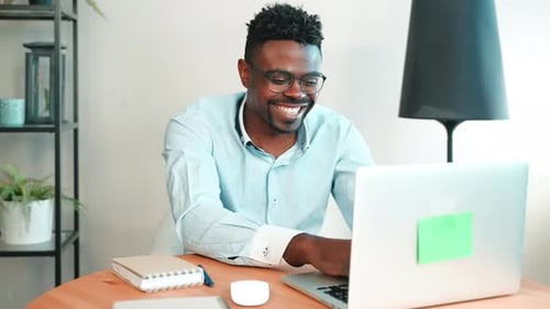 Man Working Remotely in Home Office